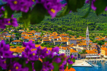 Jelsa old town with stone houses and fishing boats, Croatia