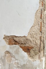 cracked concrete old brick wall.