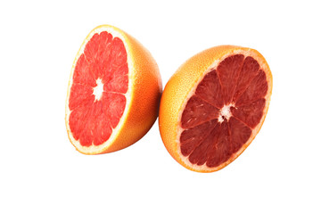 two halves of grapefruit on a white background in isolation