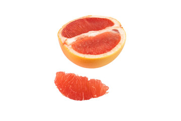 whole grapefruit and slices on a white background in isolation