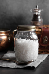 France sea salt in glass bottle on kitchen rustic style