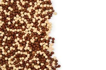 Frame of chocolate corn flakes  isolated on white background.