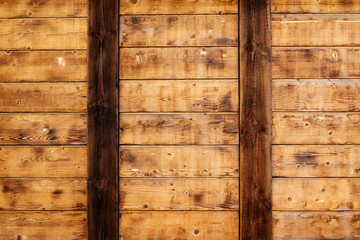 brown bright and orange wooden boards with beams
