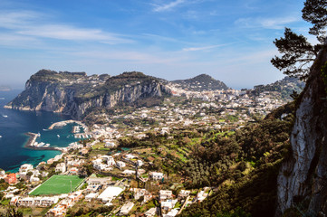 Fototapeta na wymiar Top view of the city of Capri, the port and the Gulf of Naples.