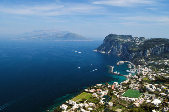 Beautiful top view of the port of Capri and the Gulf of Naples.