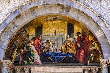 Naklejka premium Saint Mark's body venerated by the doge mosaic at facade of Basilica di San Marco in Venice, Italy