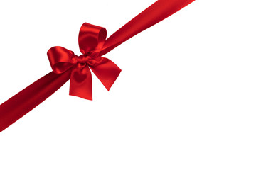Red gift bow on white