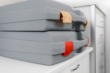 Closeup photo of gray container with modern medical equipment