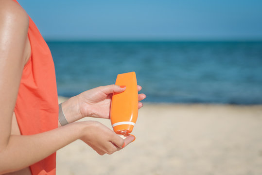 Youth And Skin Protection. The Application Of A Sunscreen Cream.