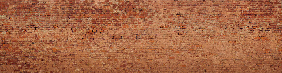 Grand fond de mur de briques anciennes