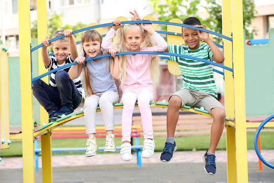 Cute little children on playground © Pixel-Shot
