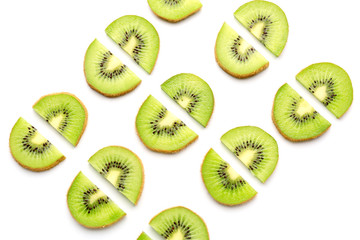 Slices of ripe kiwi on white background