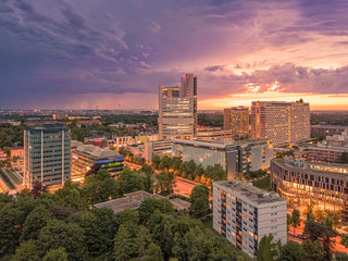 Munich from above, a panoramic droneshot in the colorful evening.