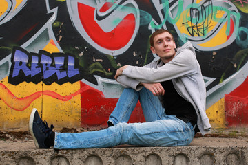 a young man in a hoodie hip-hop