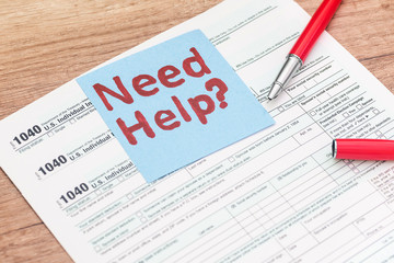 Obraz premium 1040 tax form with sticker - need help