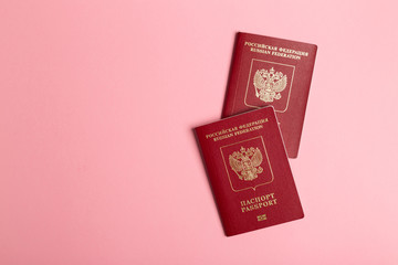 Russian passport on pink background. Travel concept.
