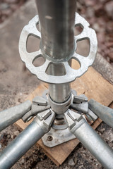 Elements of scaffolding as part of equipment for the reconstruction of the bridge.