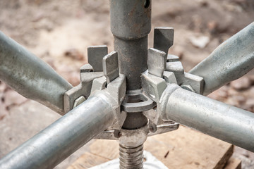 Elements of scaffolding as part of equipment for the reconstruction of the bridge.