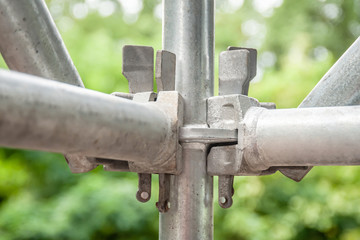 Elements of scaffolding as part of equipment for the reconstruction of the bridge.