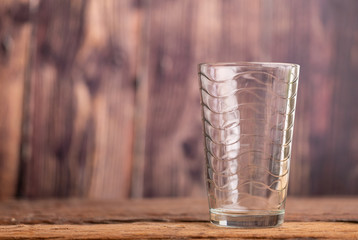 Empty clear glass of water on the wooden table