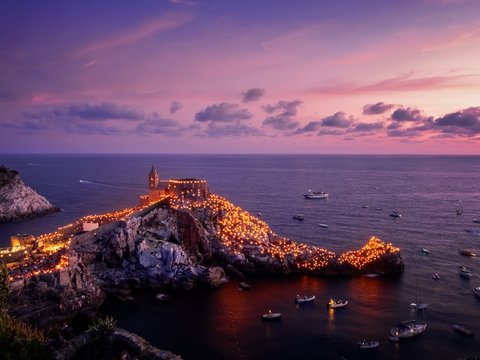 Sunset sees the start of the Festival of the White Madonna, Portovenere, Liguria, Italy. Annual religious event in remembrance of a miracle in 1399.