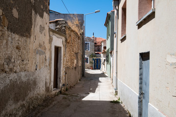 Fototapeta na wymiar Traditional street in the old town of Yenifoca. Yenifoca is a town in Turkey's Izmir Province on the Aegean coast.