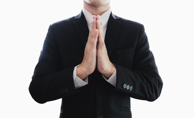 Businessman pay obeisance, welcome in Thai culture hand sign, isolated on white background