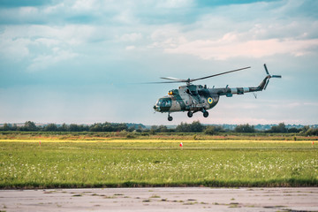 Fototapeta na wymiar takeoff of a military helicopter