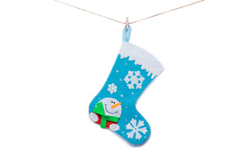 Christmas sock on a white isolated background. Ornament snowman with snowflakes, felt material, handmade