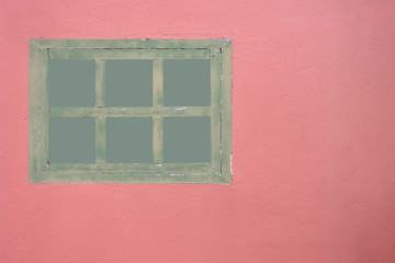 Obraz na płótnie Canvas Vintage green window frames on red walls