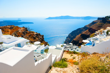 White architecture on the caldera on Santorini island, Greece. Summer landscape, sea view.