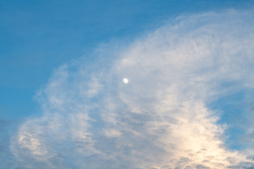 Beautiful blue sky with cloudy and moon on the day, when the sun is about to set. sky background with moon light.