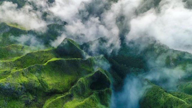 Aerial shot of the cliff mountain and the sea in Na Pali coast in Kauai Hawaii