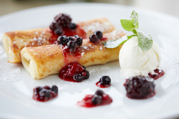 pancakes with berries and ice cream