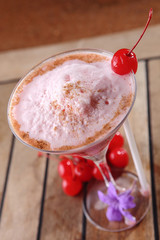 Cocktail Silk Stockings is a very popular beverage with tequila, grenadine, white cocoa liqueur, and cream. It is served in a cocktail glass.