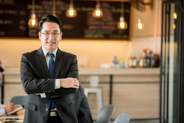 Portrait of happy asian  businessman.