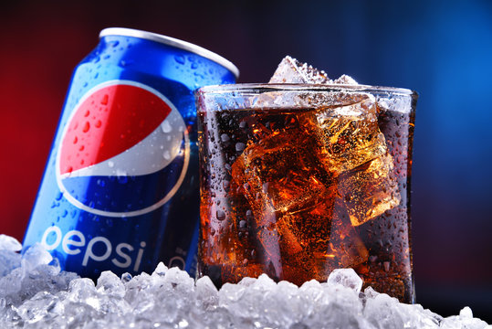 A can and a glass of Pepsi
