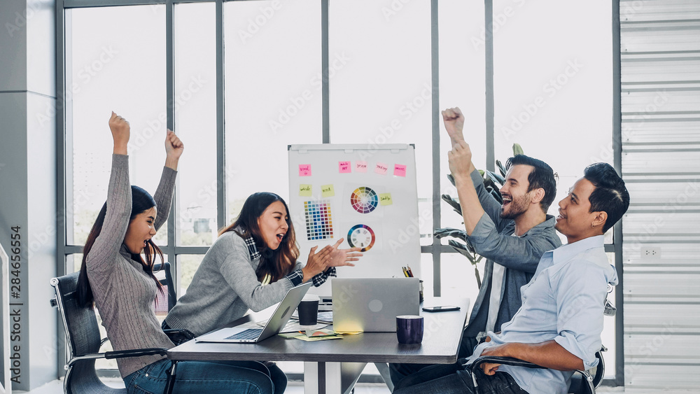 Poster diversity creative designer applaud for job success at meeting table at modern office after finish p
