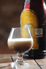 A White Russian is a cocktail made with vodka, coffee liqueur and cream served with ice in an Old Fashioned glass. Often milk or half and half will be used as an alternative to cream..