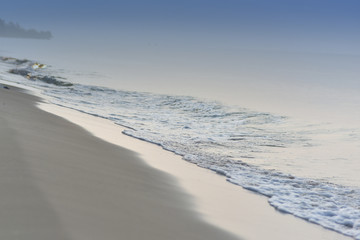 Waves were crashing onto the beach