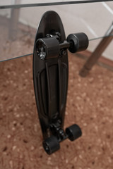 black little plastic skateboard short cruiser
