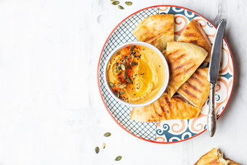 chickpeas hummus with olive oil and smoked paprika