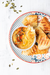 chickpeas hummus with olive oil and smoked paprika