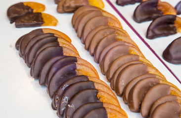Dried orange slices cover with dark and milk chocolate
