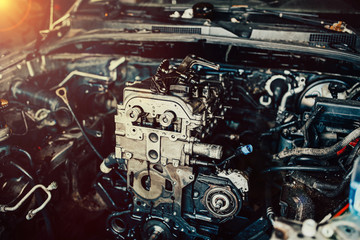 repair of an internal combustion engine of a car. Details of the motor.