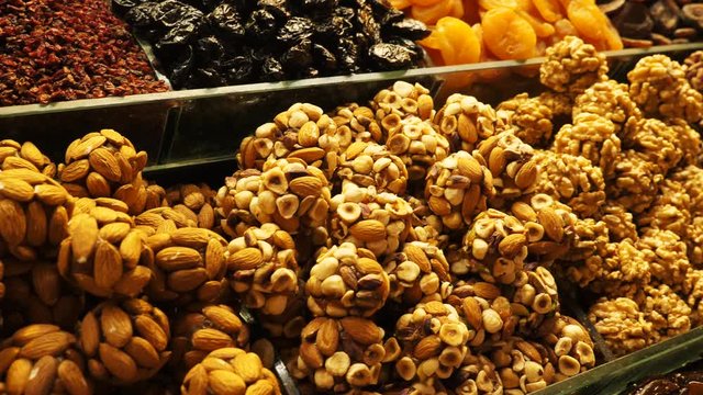 Natural organic sweets from various nuts close up