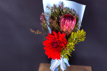 Colorful fresh bouquet of flowers on isolated black background