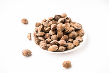 delicious nutritious fried apricot pits with salt