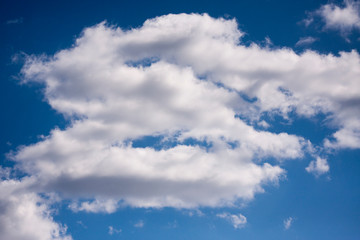 Obraz premium White clouds in the blue sky. Ozone Layer. Blue background