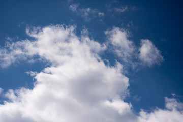 Naklejka na ściany i meble White clouds in the blue sky. Ozone Layer. Blue background